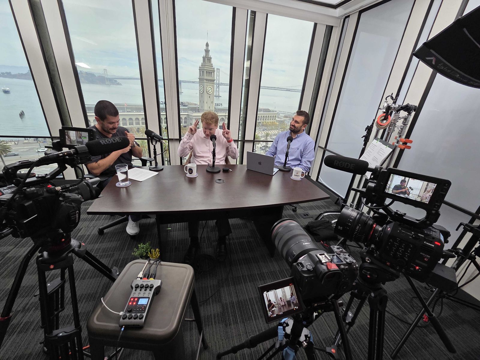 Podcast recording in San Francisco, in a studio overlooking the Ferry Building and Bay Bridge